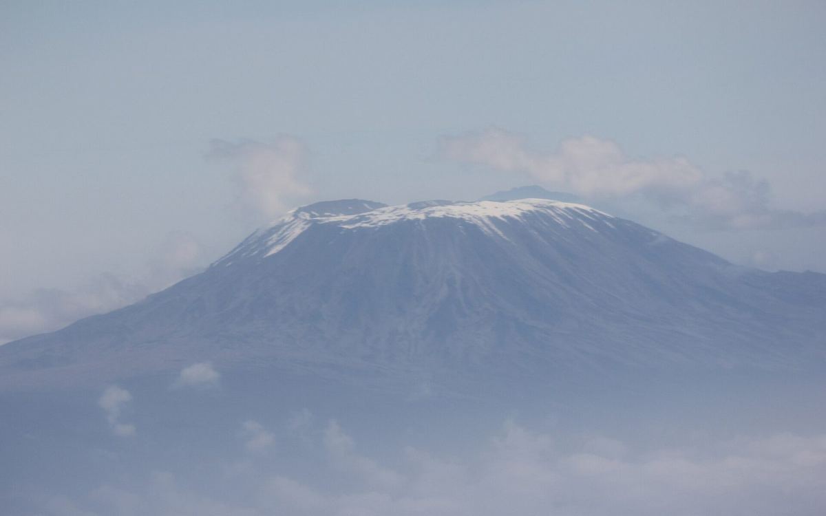 Aerial view of Mount Kilimanjaro from above the clouds